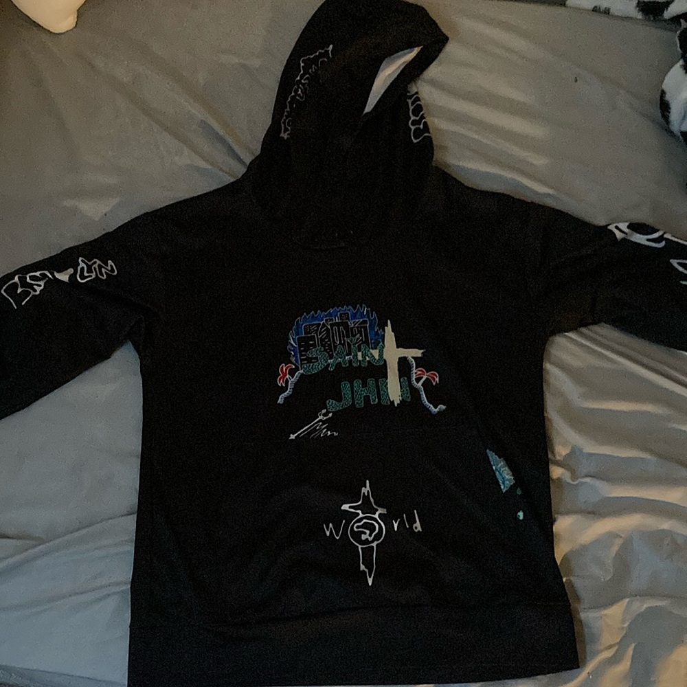travis scott hoodie with saint john written on it